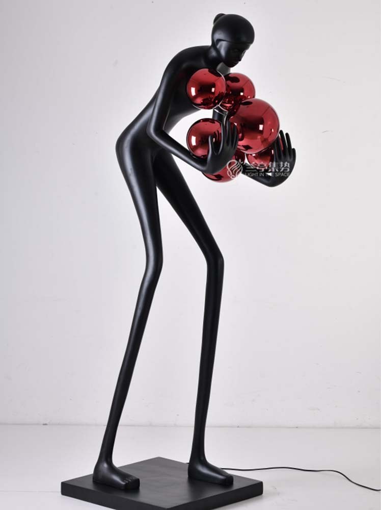 Figure with Red Globes Lamp