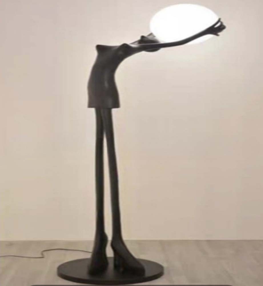 Leaning Figure Globe Lamp